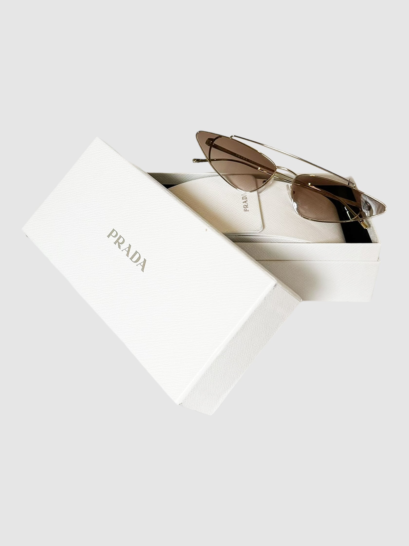 Prada UltraVox Light Gold Slim Cat-Eye Mirrored Sunglasses Consignment Secondhand Designer Luxury Resale Toronto Trendy