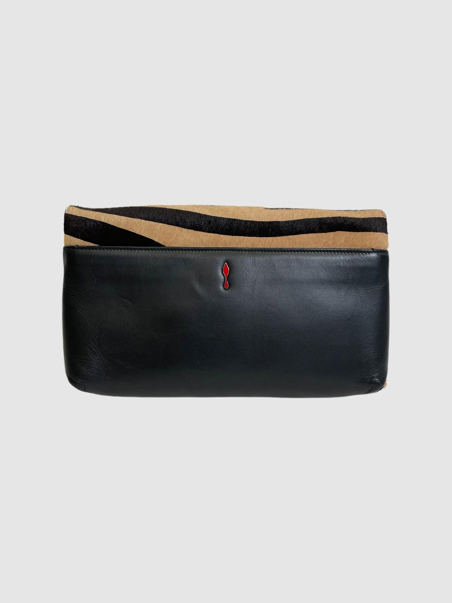 Christian Louboutin - Second Nature Boutique