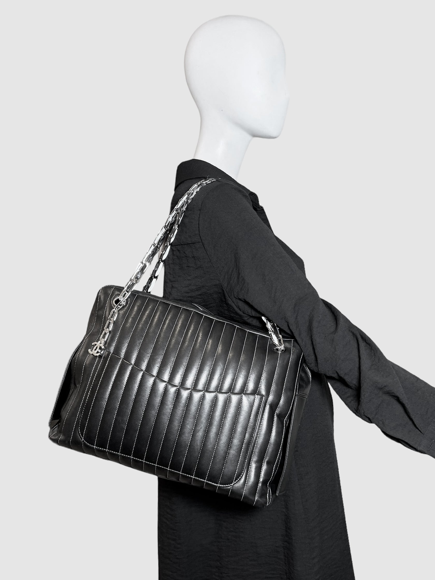 Chanel Black Mademoiselle Ligne Vertical Quilted Leather Shoulder Bag Consignment Secondhand Designer Luxury Resale Toronto Trendy