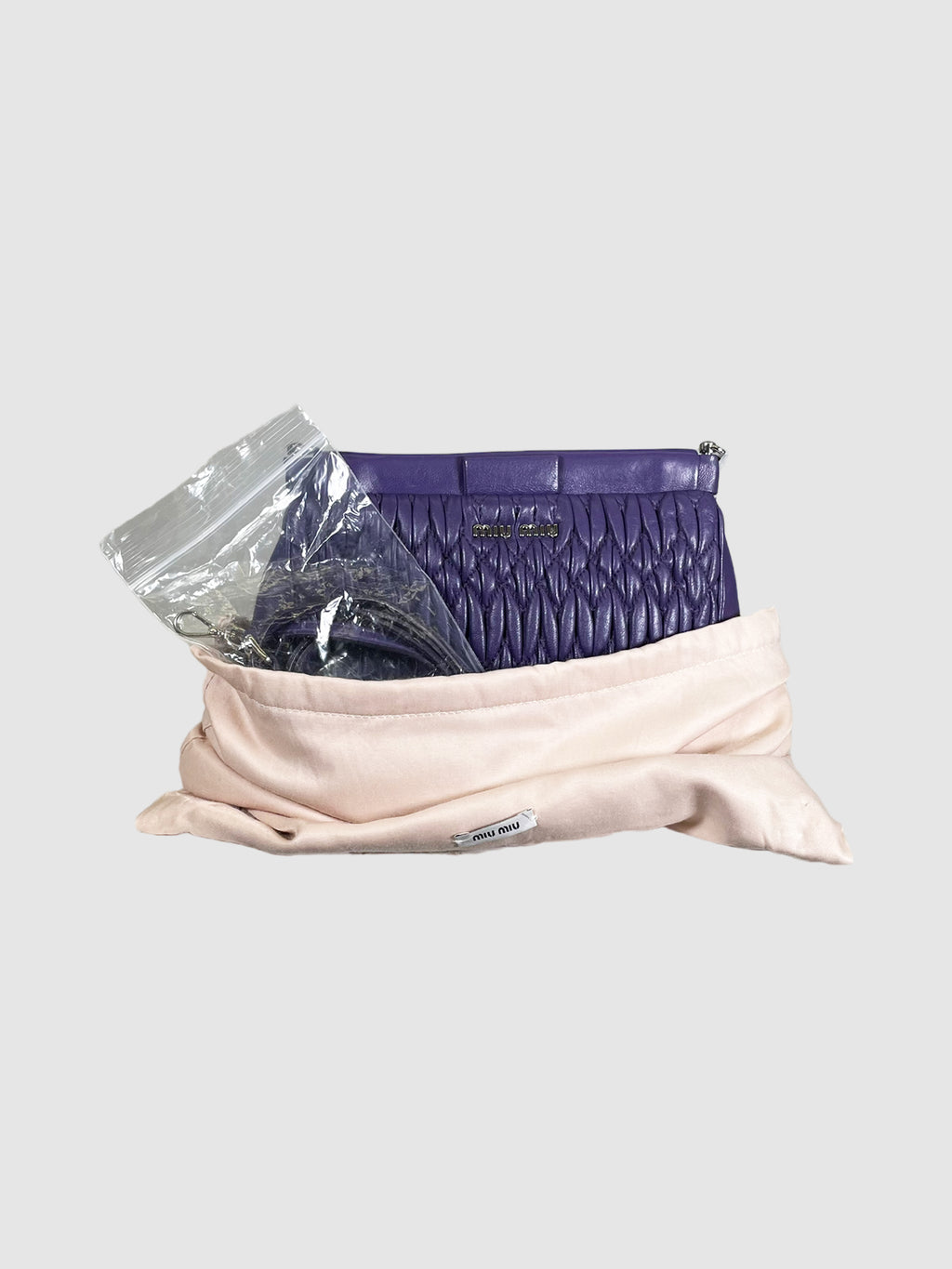 Matelassé Leather Clutch