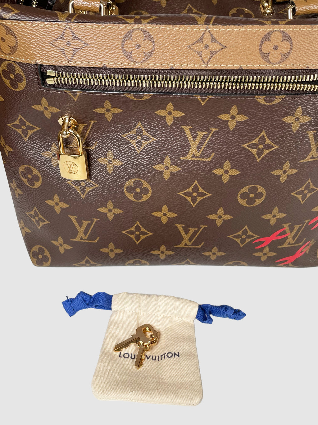 Monogram Reverse Canvas City Cruiser Bag