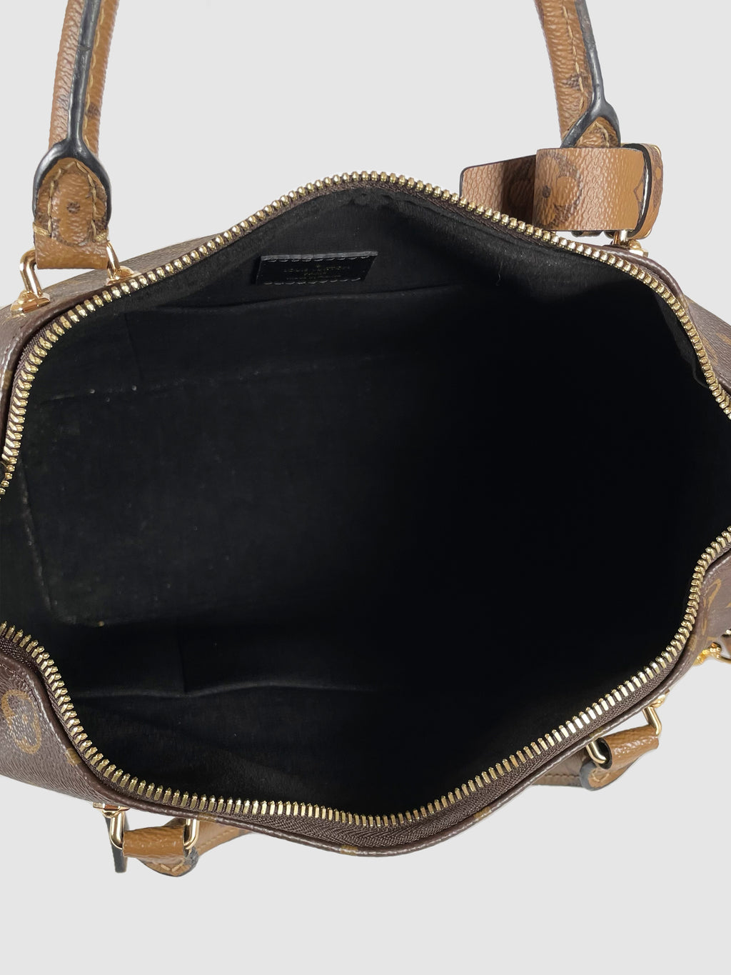 Monogram Reverse Canvas City Cruiser Bag