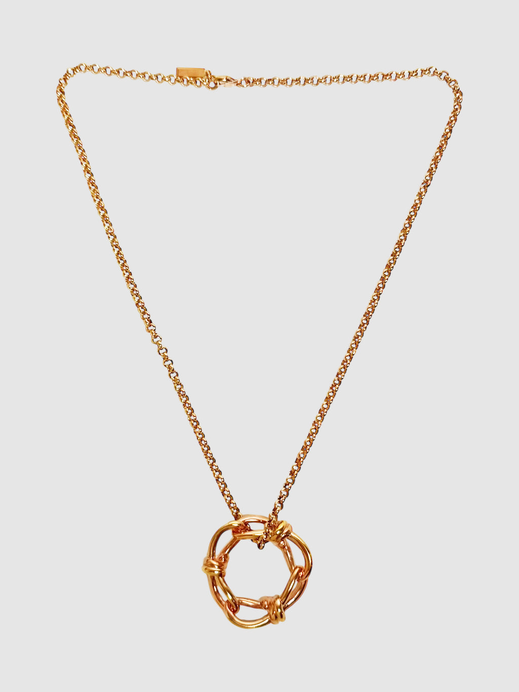 Balenciaga Rose Gold-Tone Continuity Bow Round Pendant Necklace luxury designer resale consignment secondhand Toronto Canada