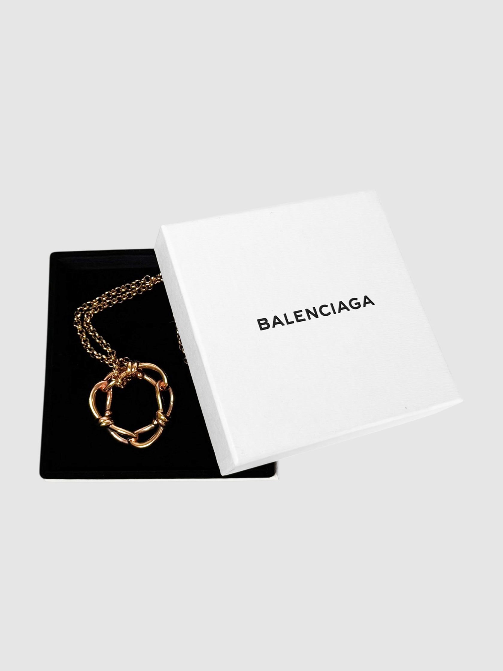 Balenciaga Rose Gold-Tone Continuity Bow Round Pendant Necklace luxury designer resale consignment secondhand Toronto Canada jewellery accessories