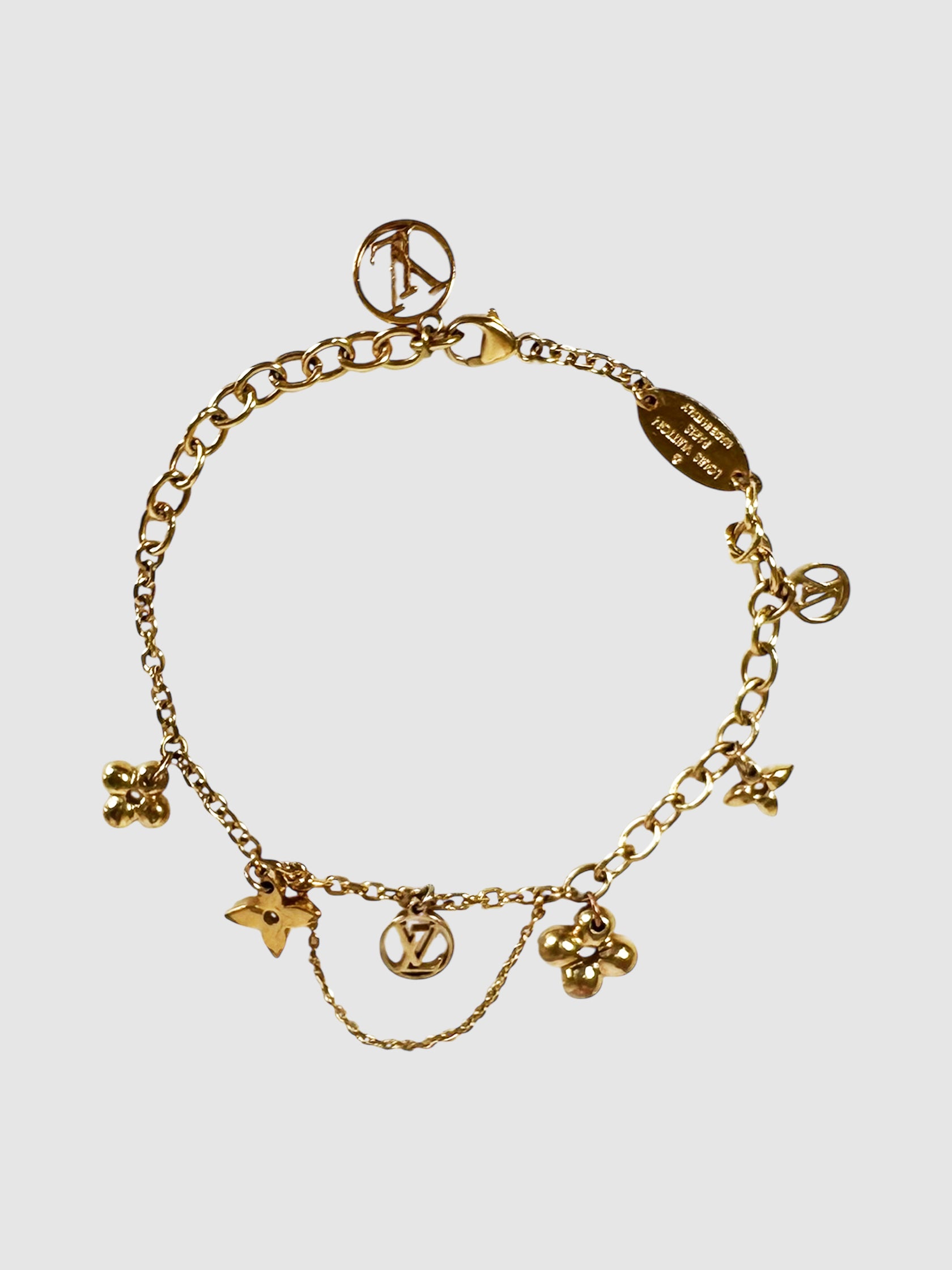 Louis Vuitton Gold-Tone Blooming Supple Chain Bracelet with Charms LV luxury designer resale consignment secondhand toronto canada