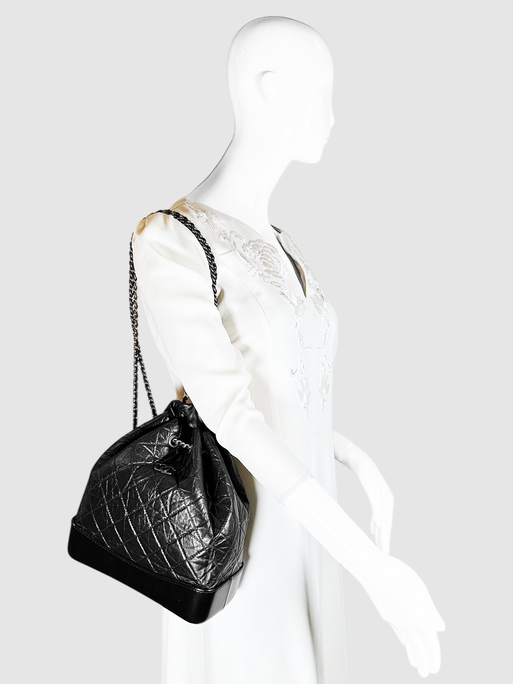 Chanel Black Quilted Aged Leather Gabrielle Bucket Backpack Luxury Designer Resale Consignment Toronto Secondhand