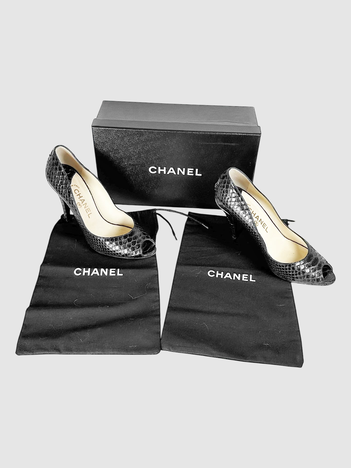 Snakeskin Pumps