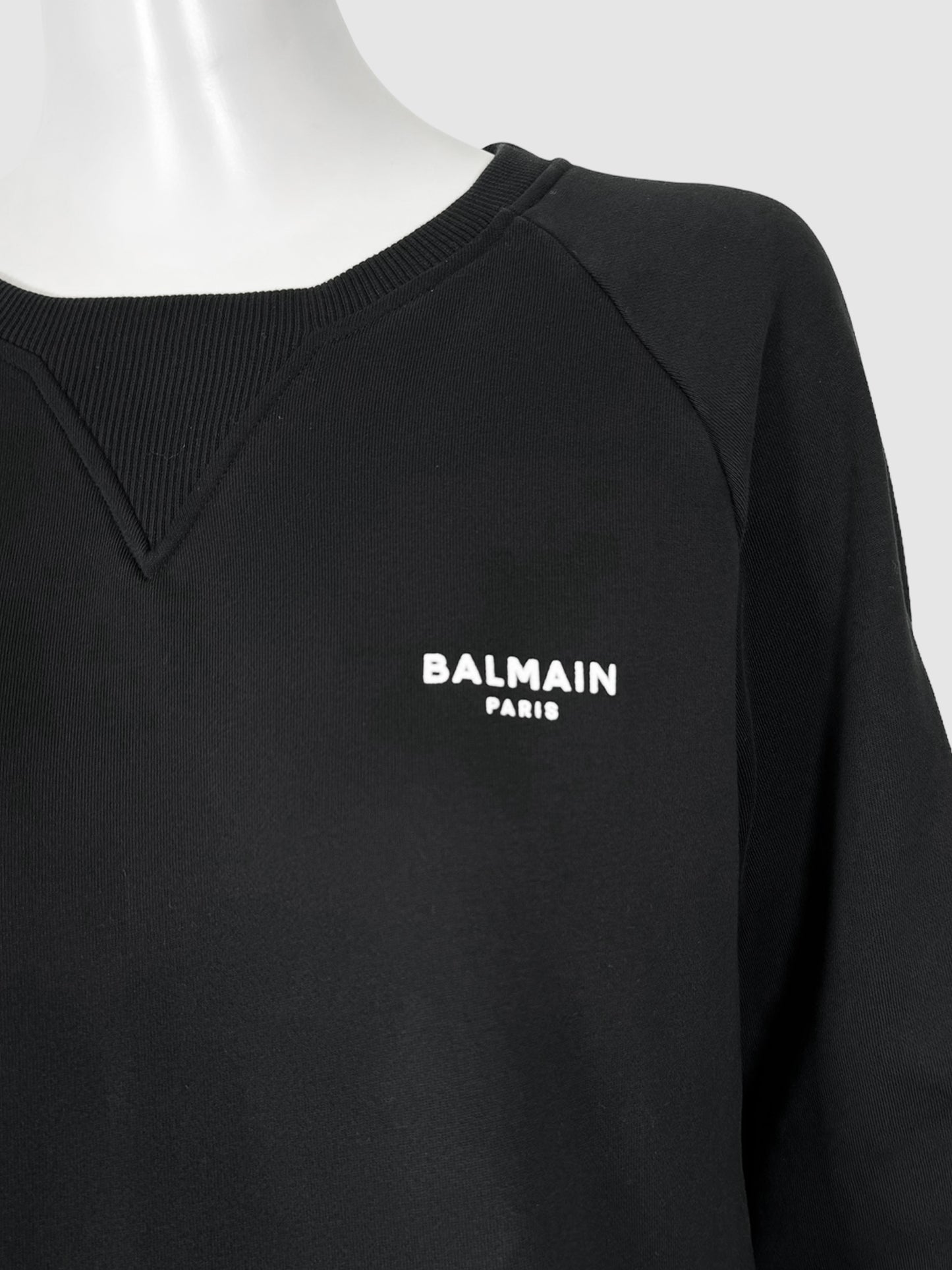 Balmain Black with White Logo Flocked Ribbed Cuff Crewneck Sweatshirt Size Medium Consignment Secondhand Designer Luxury Resale Toronto Trendy