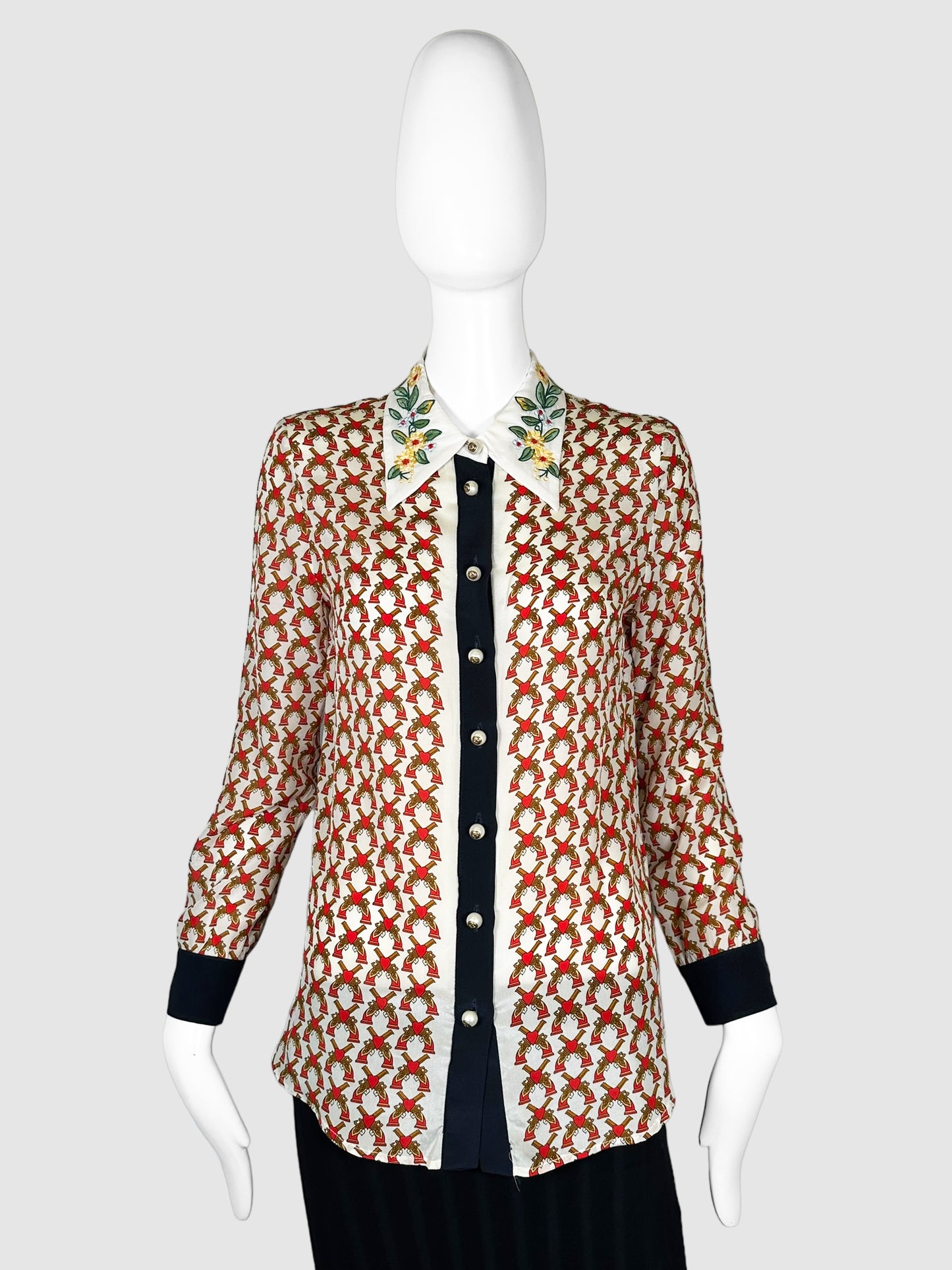 Gucci Cream, Black, Red, Brown, and Yellow Guns with Hearts Printed Button Down Top with Floral Collar Size Medium Consignment Secondhand Designer Luxury Resale Toronto Trendy