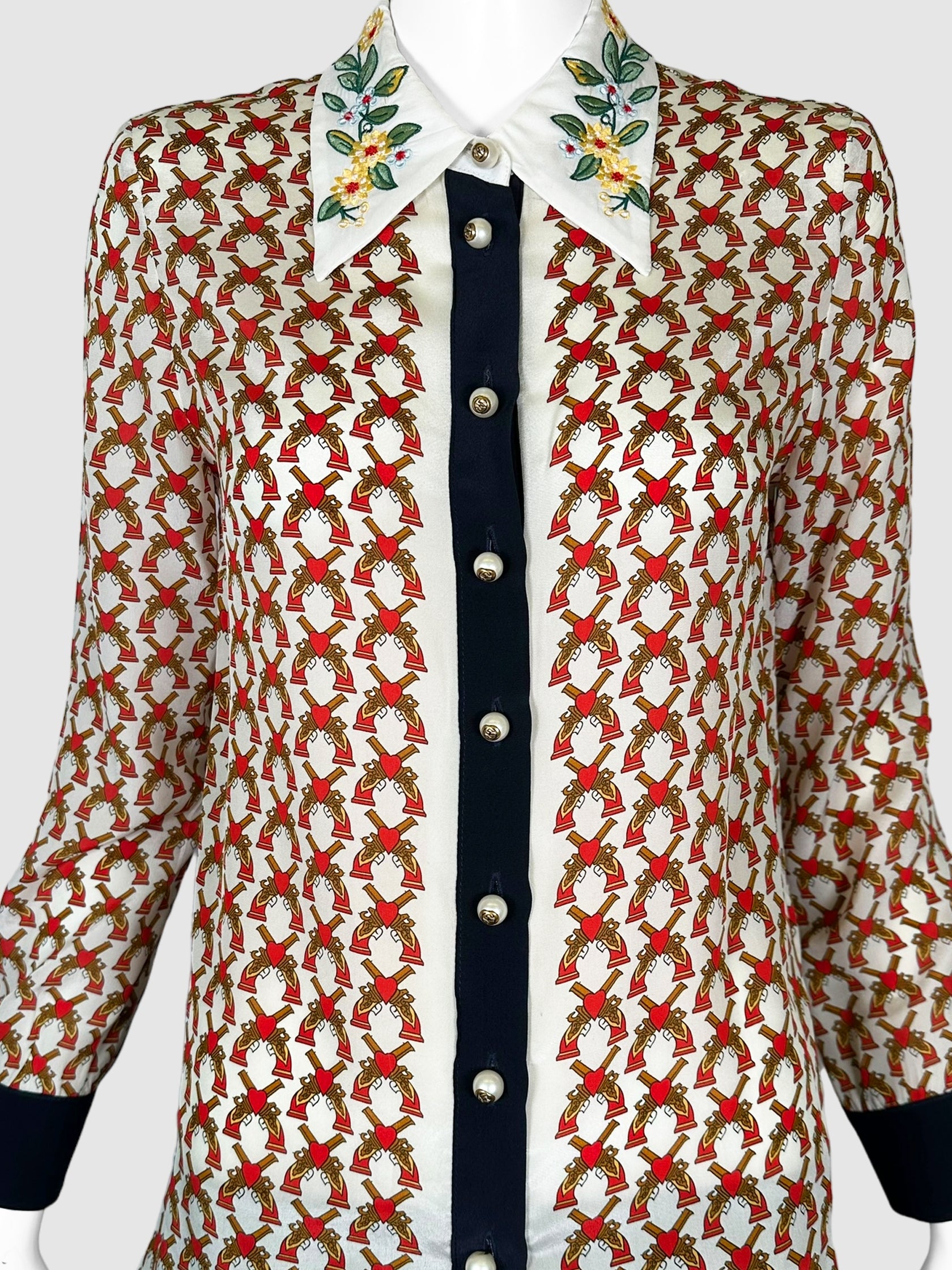 Gucci Cream, Black, Red, Brown, and Yellow Guns with Hearts Printed Button Down Top with Floral Collar Size Medium Consignment Secondhand Designer Luxury Resale Toronto Trendy