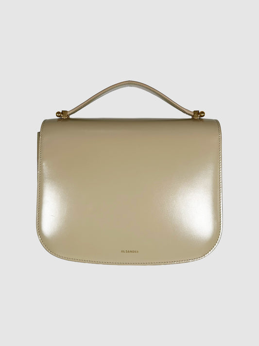 Jil Sander Cream Leather Taos Bag Consignment Secondhand Designer Luxury Resale Toronto Trendy