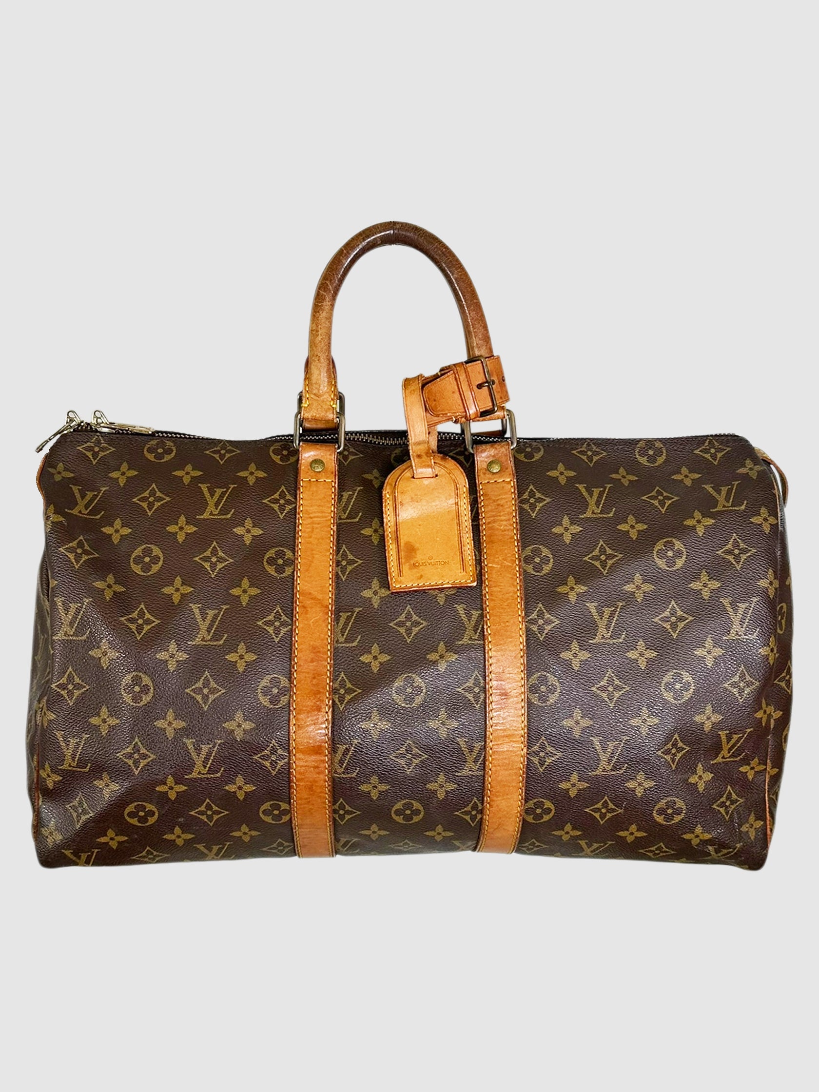 Louis Vuitton Brown Canvas and Leather Monogram Keepall 45 Bag Luxury Designer Resale Vintage Consignment Toronto Secondhand Travel Duffle VSP Vestiaire