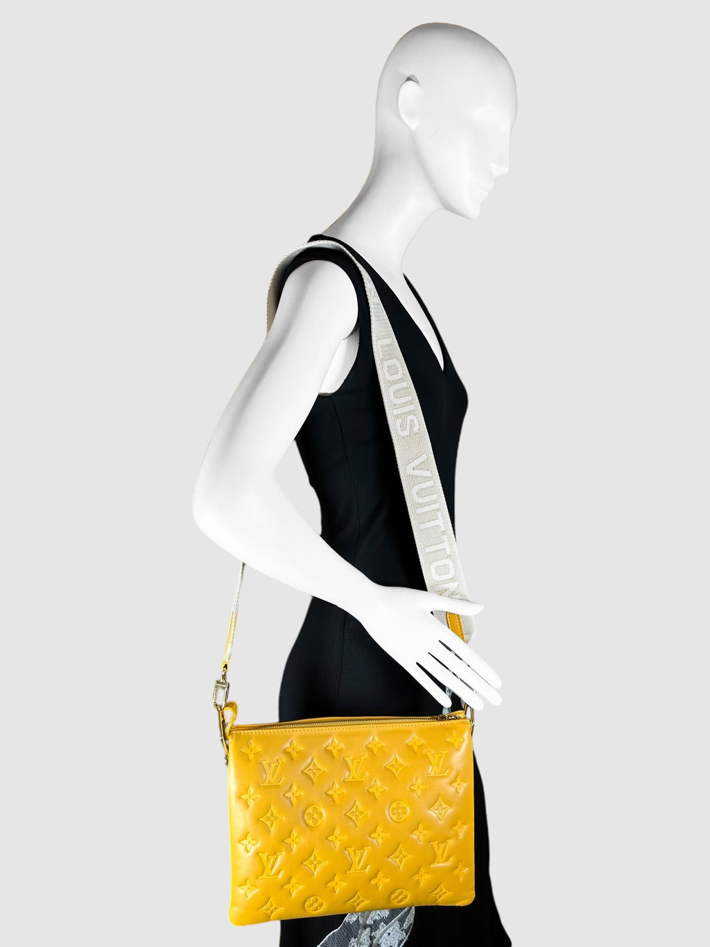 Monogram-Embossed Coussin PM Bag