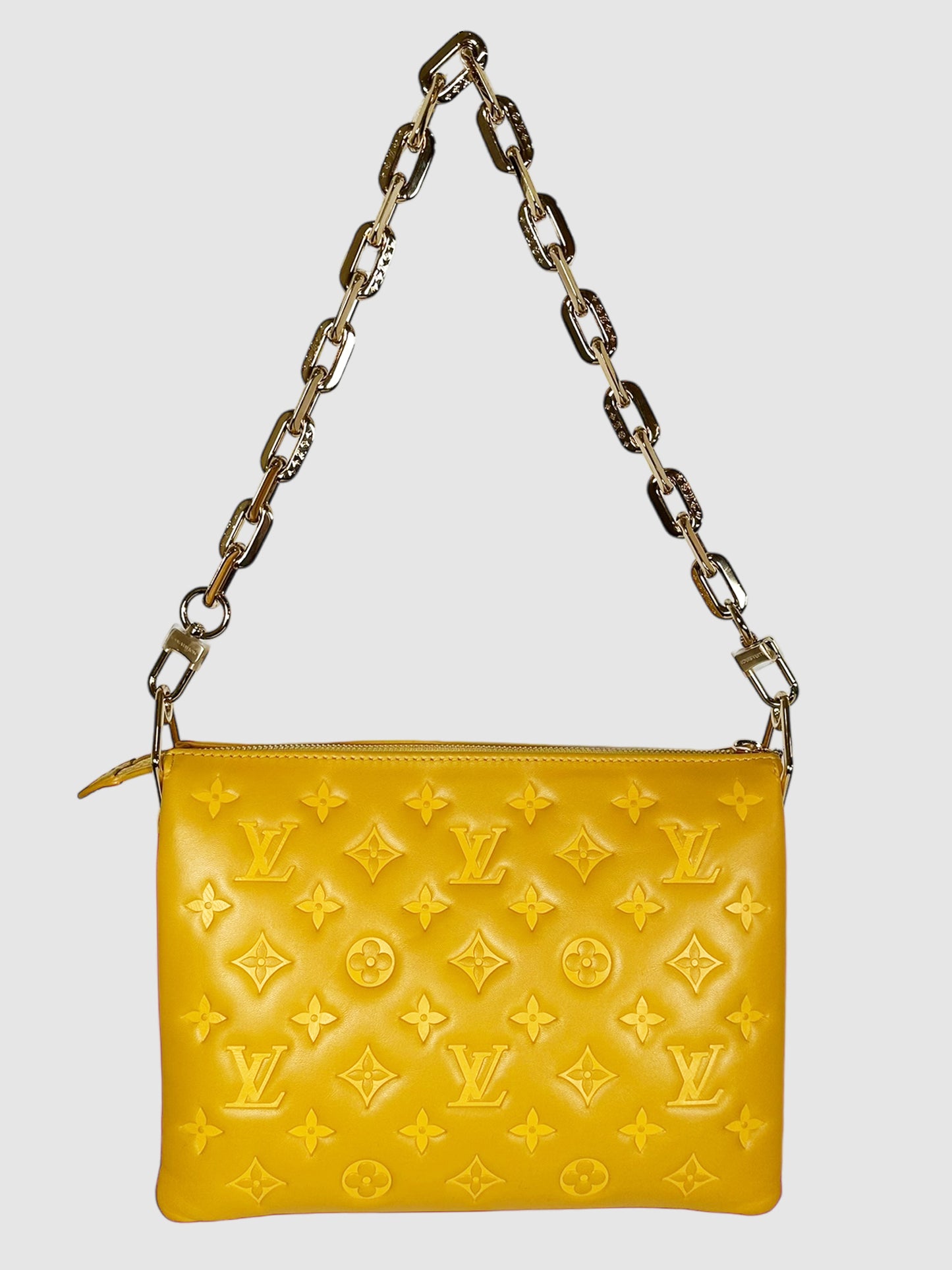 Monogram-Embossed Coussin PM Bag