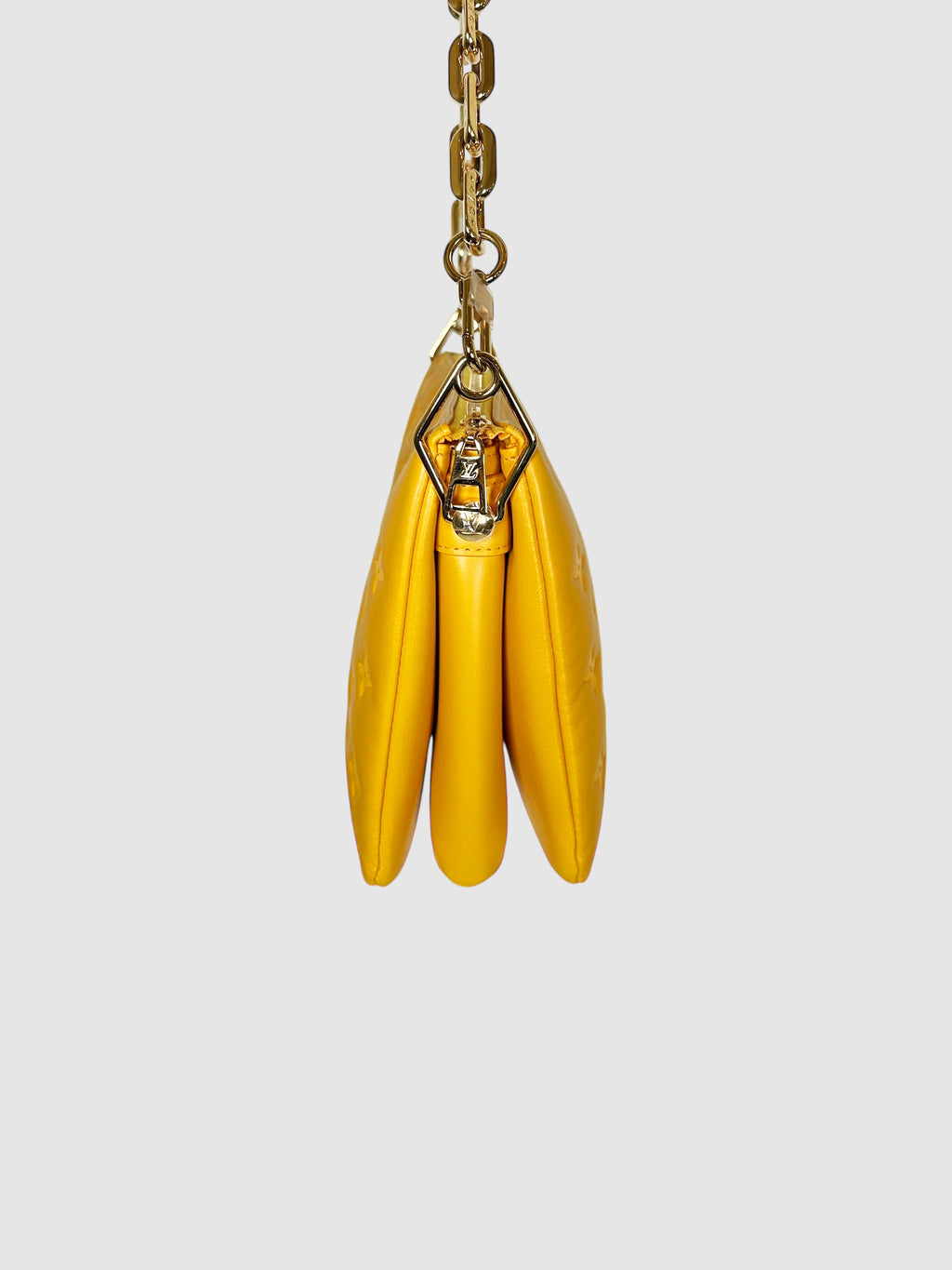 Monogram-Embossed Coussin PM Bag