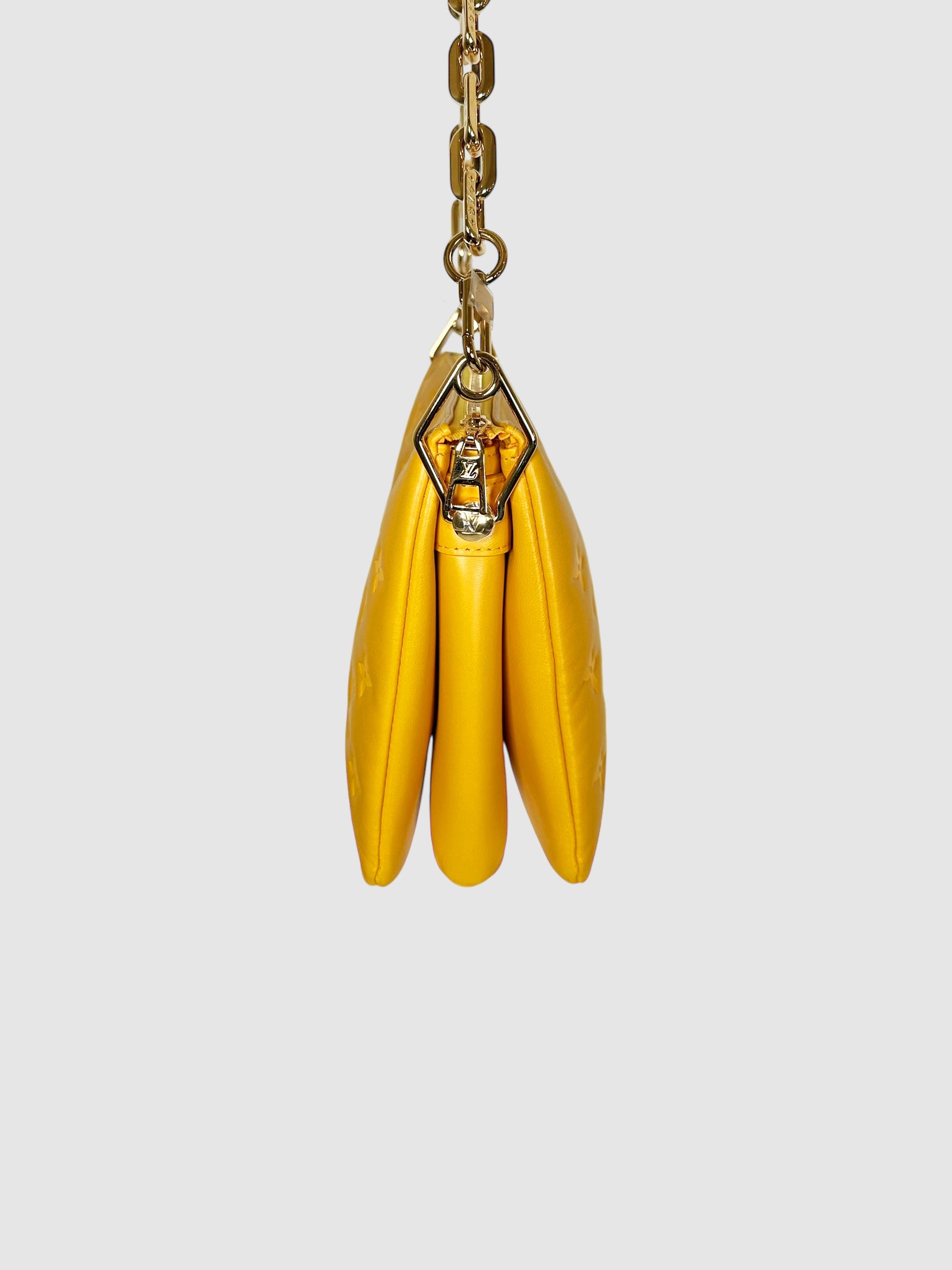 Monogram-Embossed Coussin PM Bag