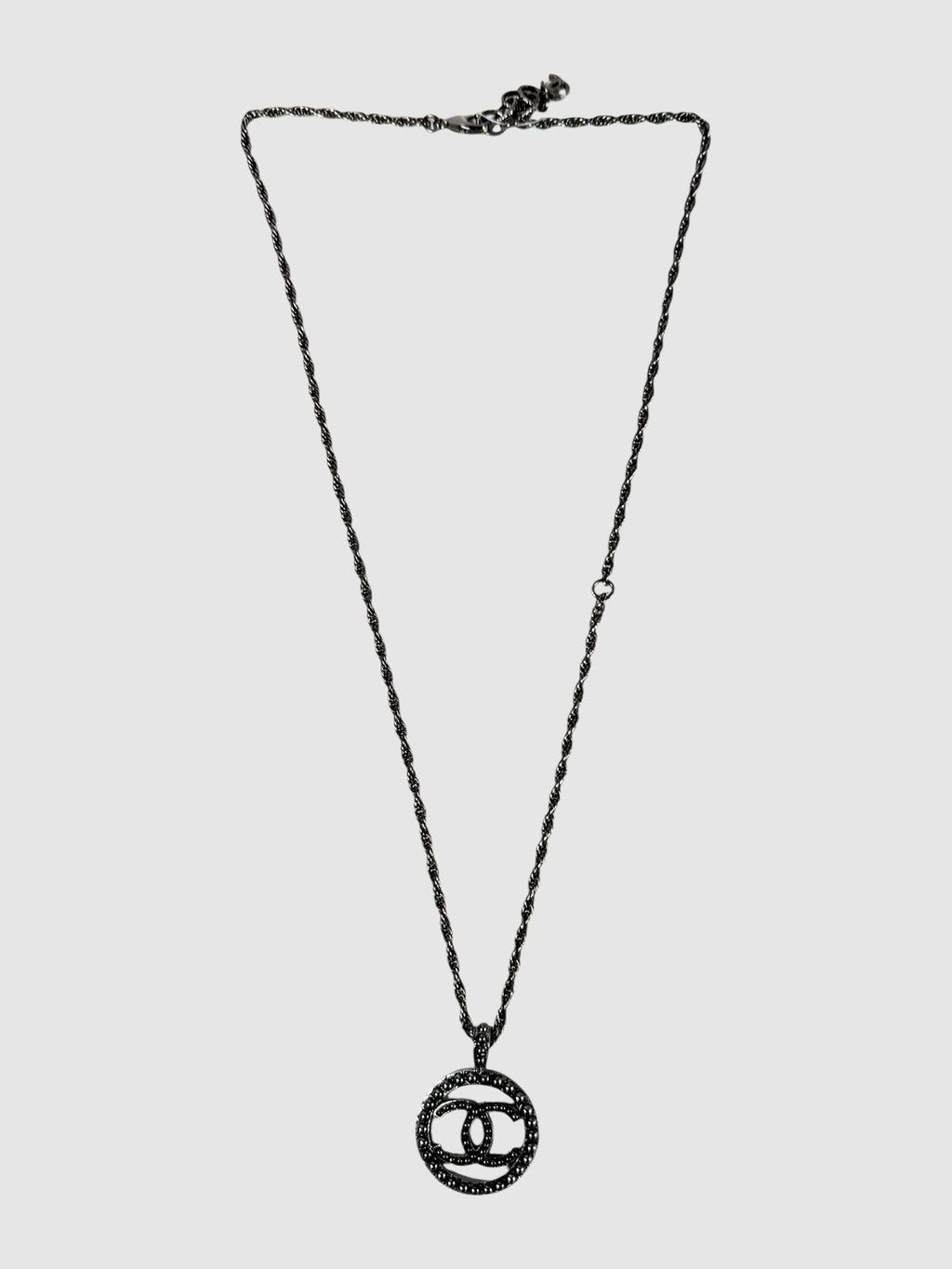Chanel 2017 Pewter CC Round Ruthenium Pendant Necklace luxury designer resale consignment toronto canada secondhand 