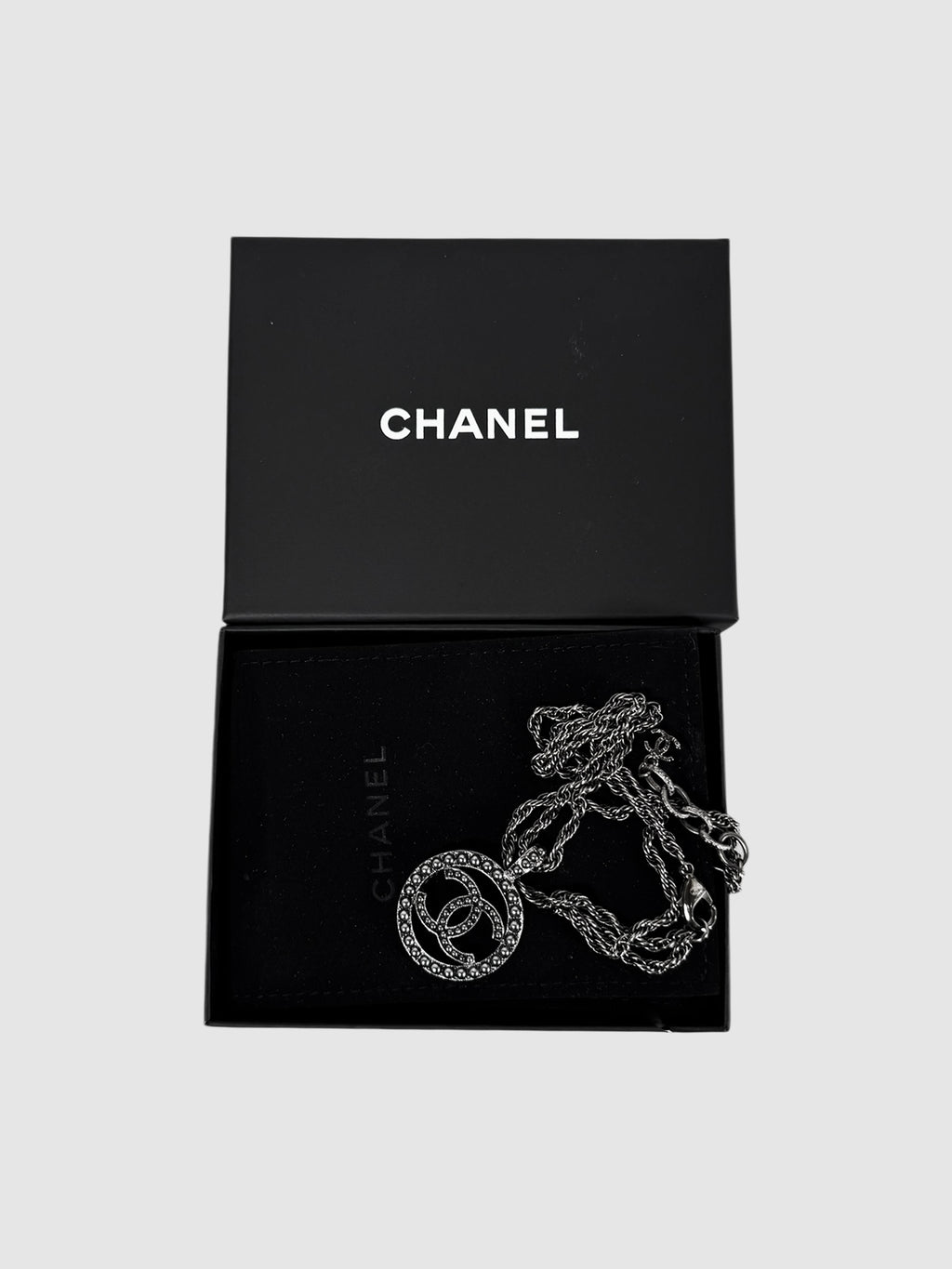 Chanel 2017 Pewter CC Round Ruthenium Pendant Necklace luxury designer resale consignment toronto canada secondhand 