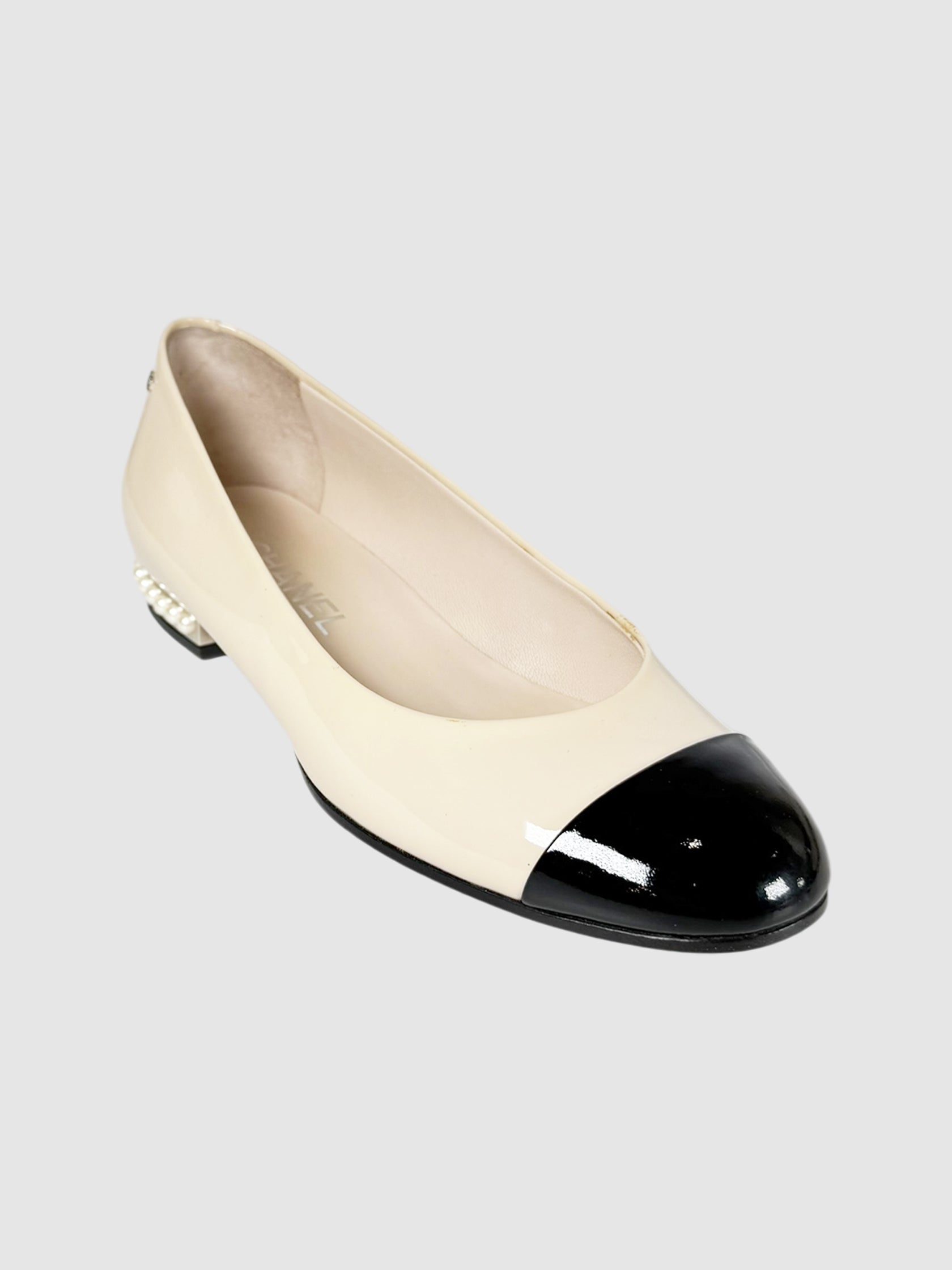 Chanel Cream and Black Cap Toe Patent Leather CC Ballerina Flats with Faux Pearl Embellishments on Heel, Size 37 luxury designer resale consignment toronto canada secondhand