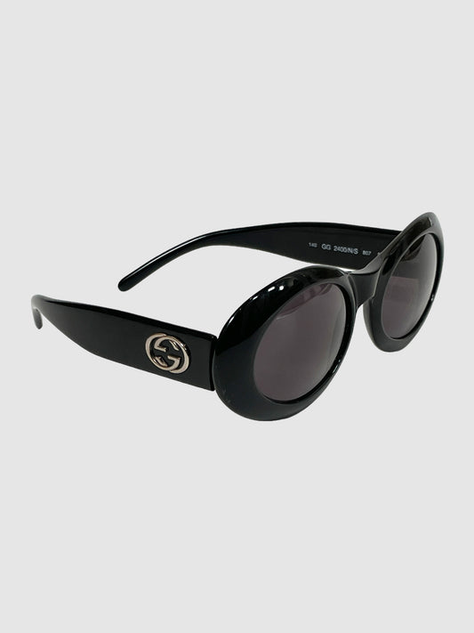 Gucci Oval Sunglasses in Black Acetate