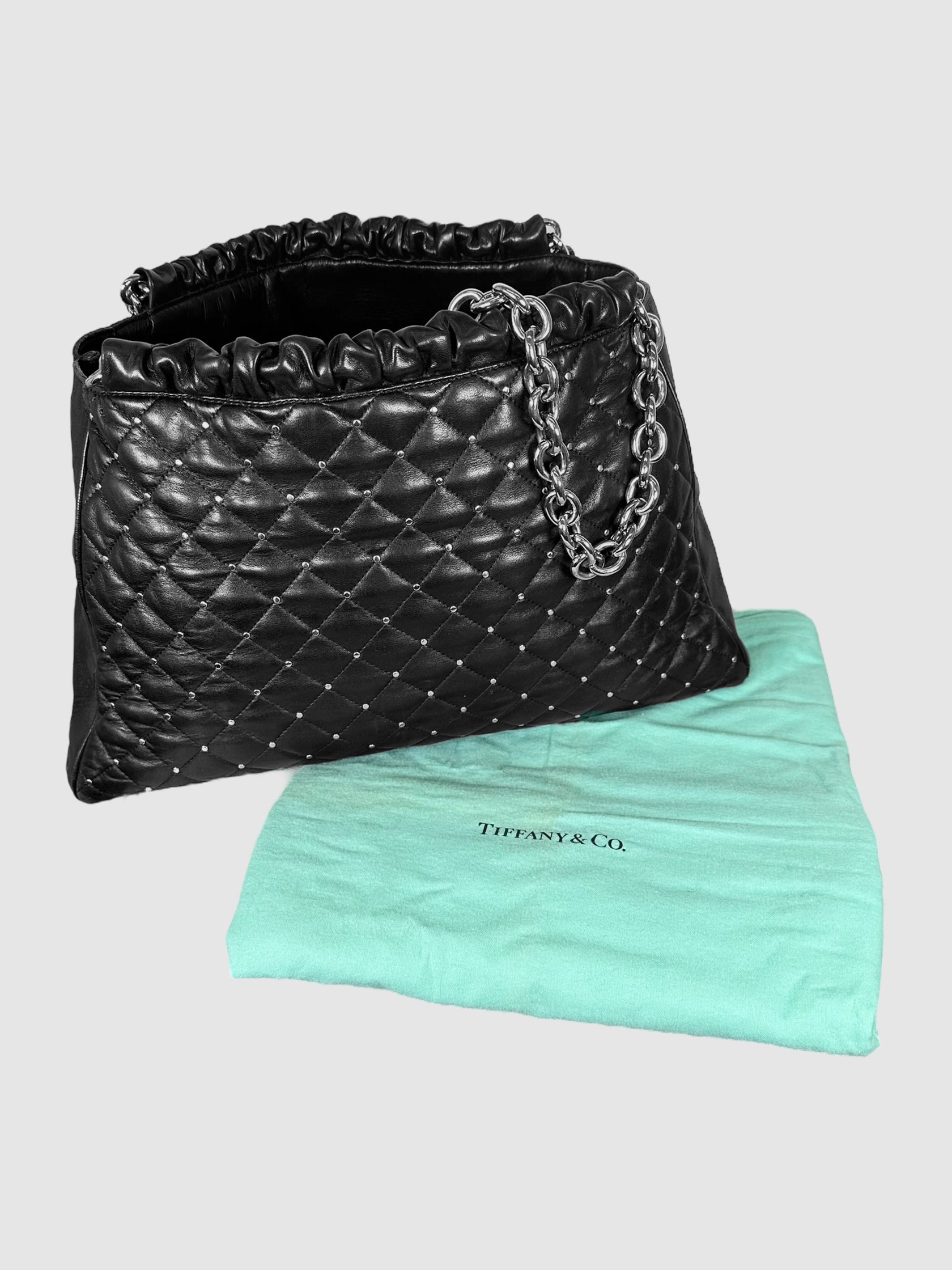 Tiffany & Co. Black Quilted and Studded Leather Tote Bag with Chainlink Shoulder Straps Consignment Secondhand Designer Luxury Resale Toronto Trendy
