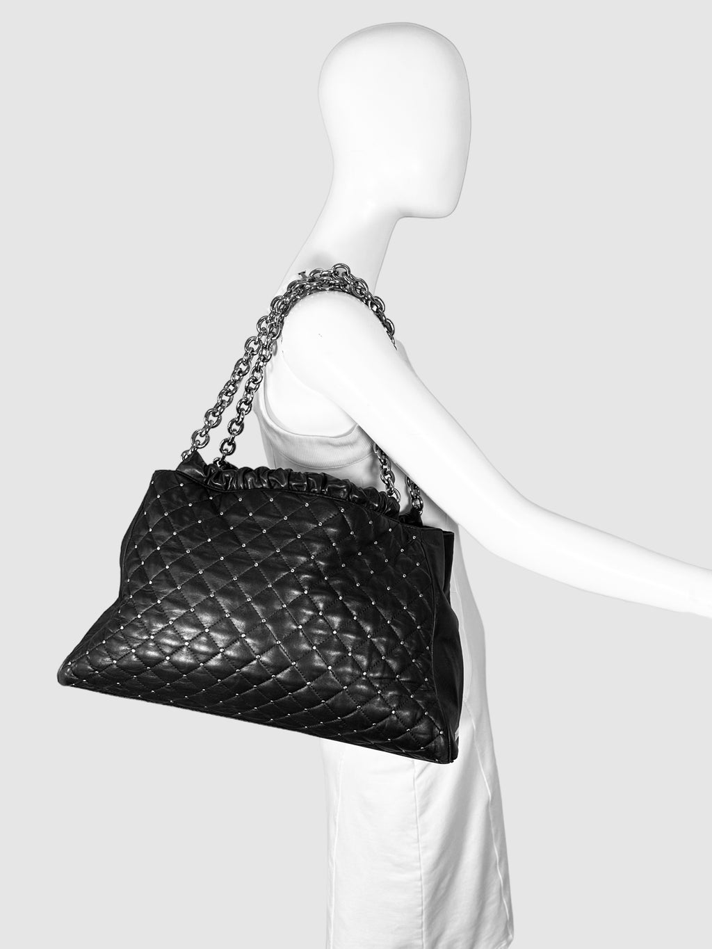 Tiffany & Co. Black Quilted and Studded Leather Tote Bag with Chainlink Shoulder Straps Consignment Secondhand Designer Luxury Resale Toronto Trendy