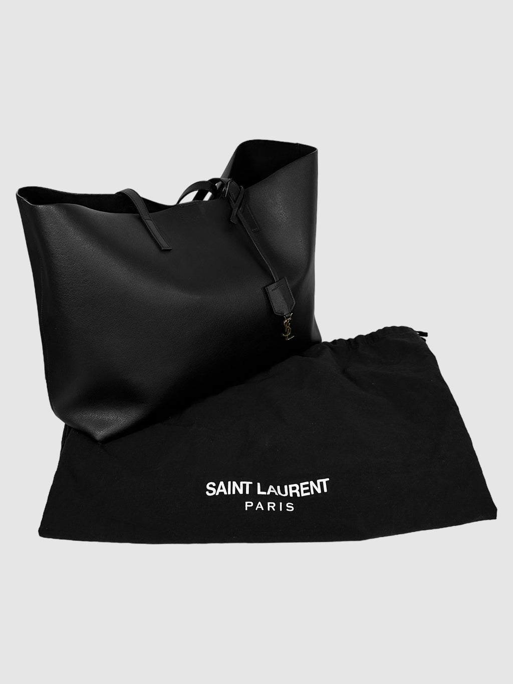 Yves Saint Laurent Black Leather Shopping Tote Bag Consignment Secondhand Designer Luxury Resale Toronto Trendy