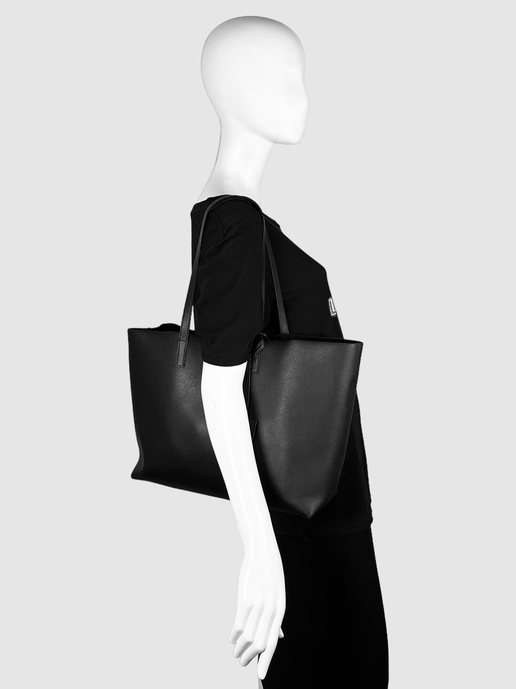Yves Saint Laurent Black Leather Shopping Tote Bag Consignment Secondhand Designer Luxury Resale Toronto Trendy