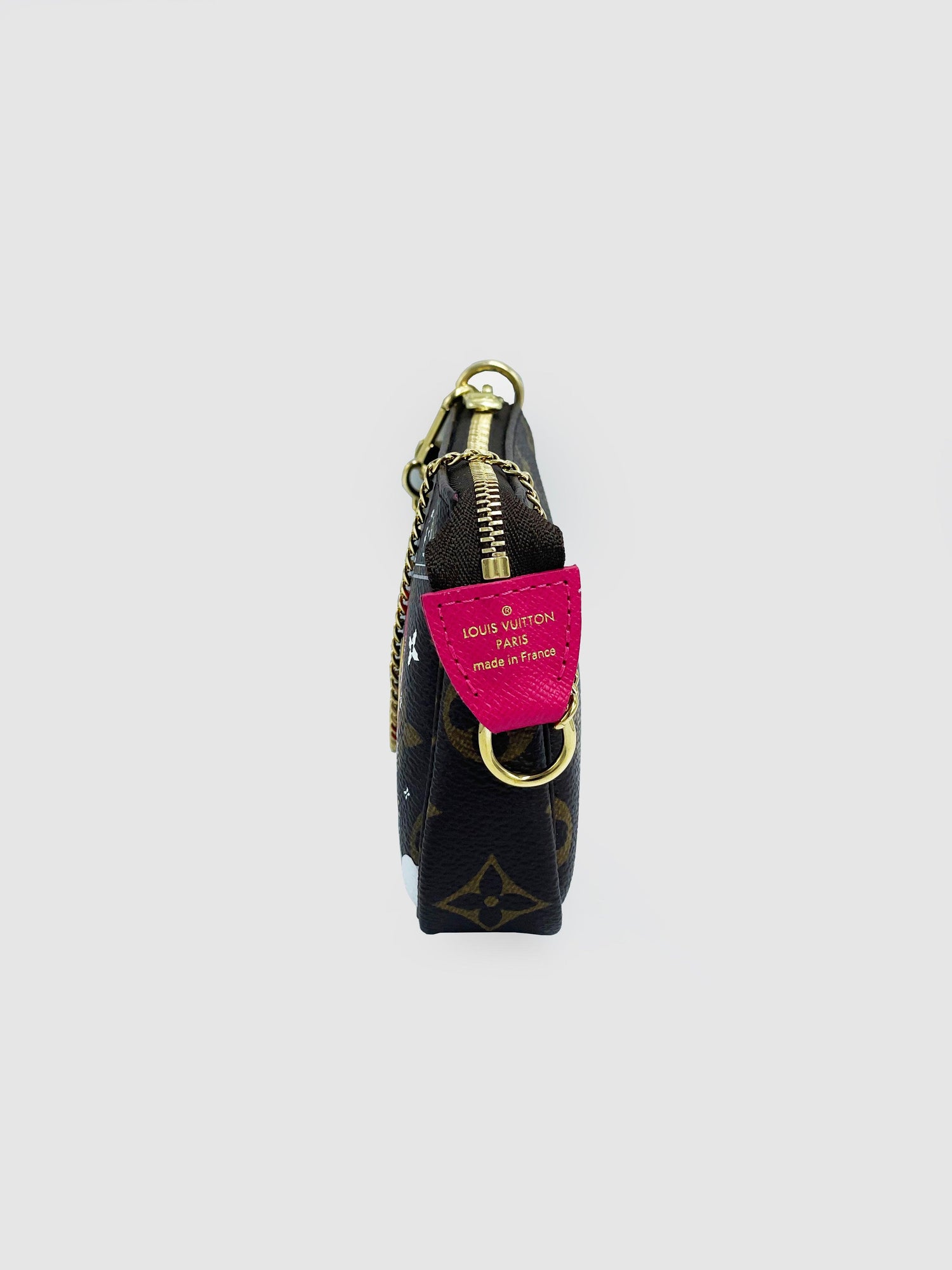 Louis Vuitton "Mini Vivienne Alp Pochette" - Second Nature Boutique