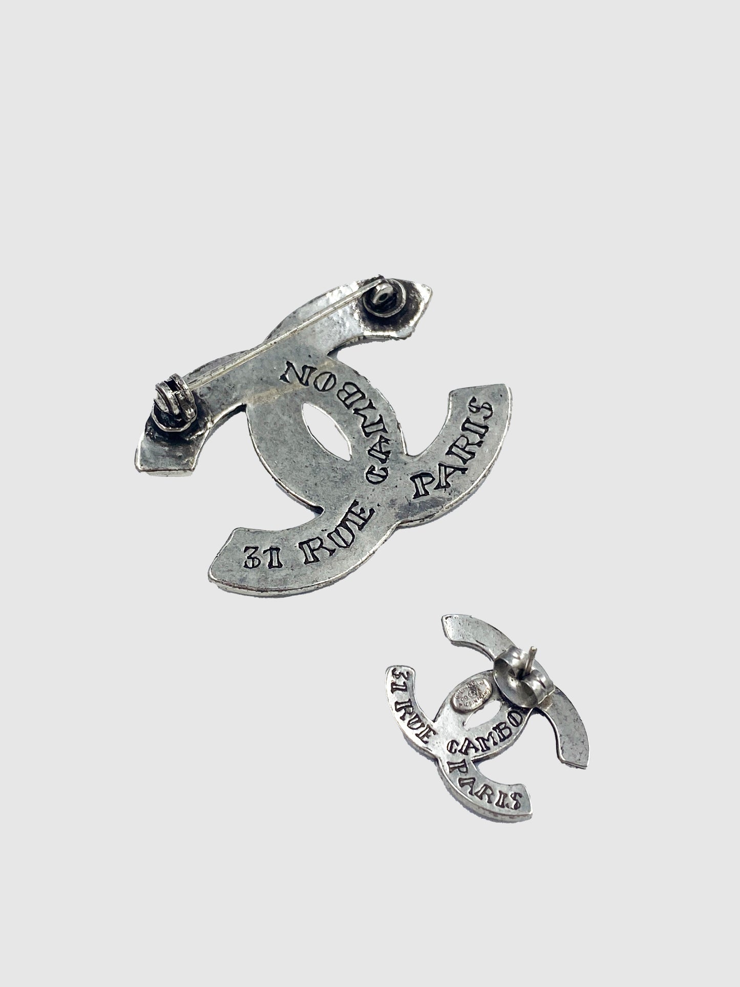 Chanel Silver-Tone Interlocking Logo with Letter Earring & Brooch Set