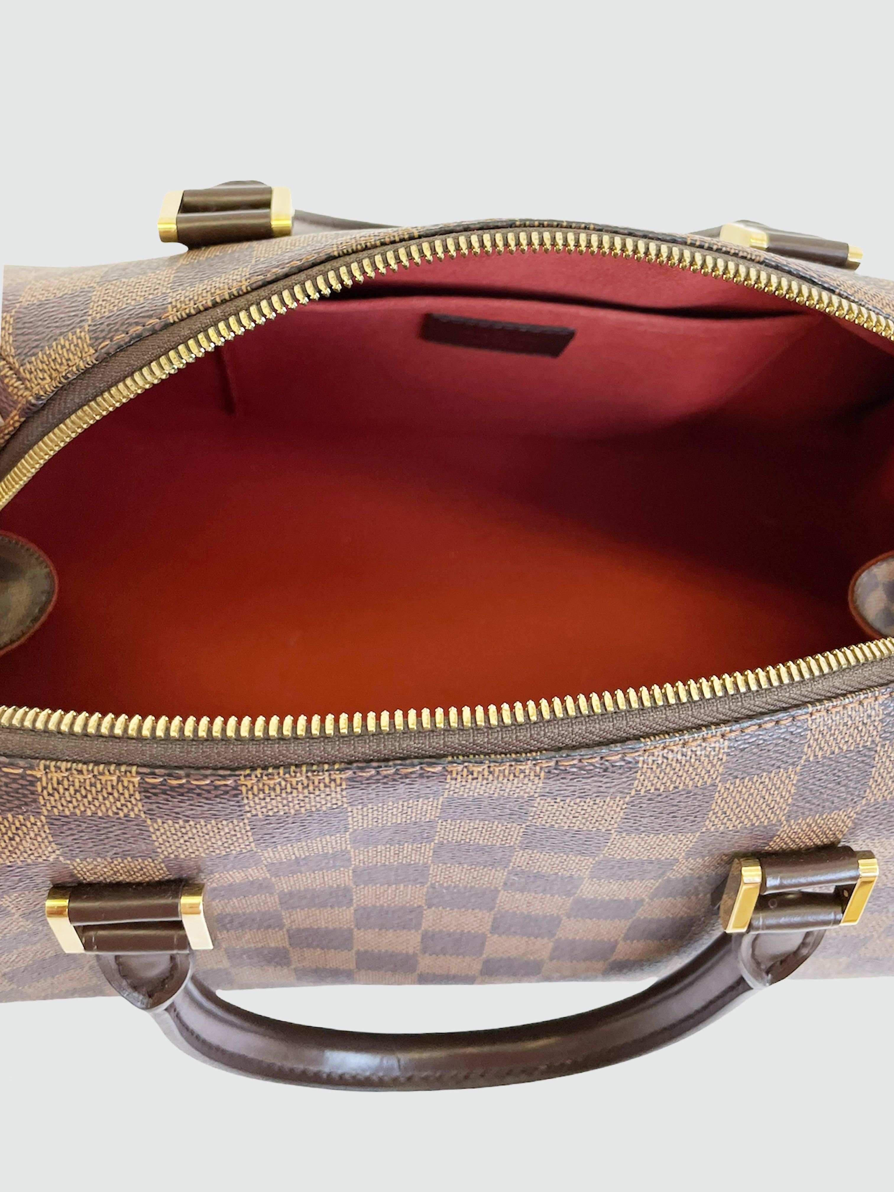 Louis Vuitton - Second Nature Boutique