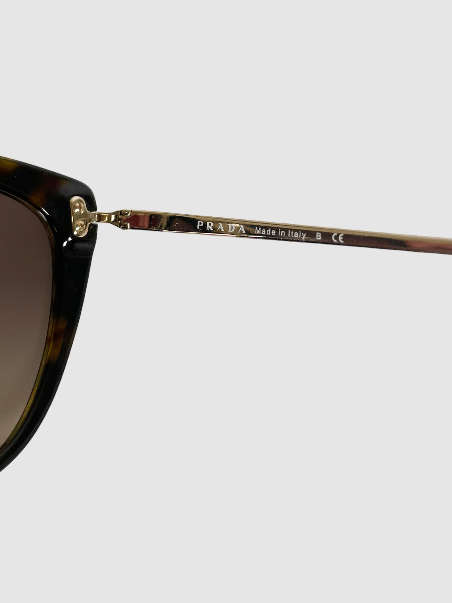 Prada Cat Eye Tinted Sunglasses