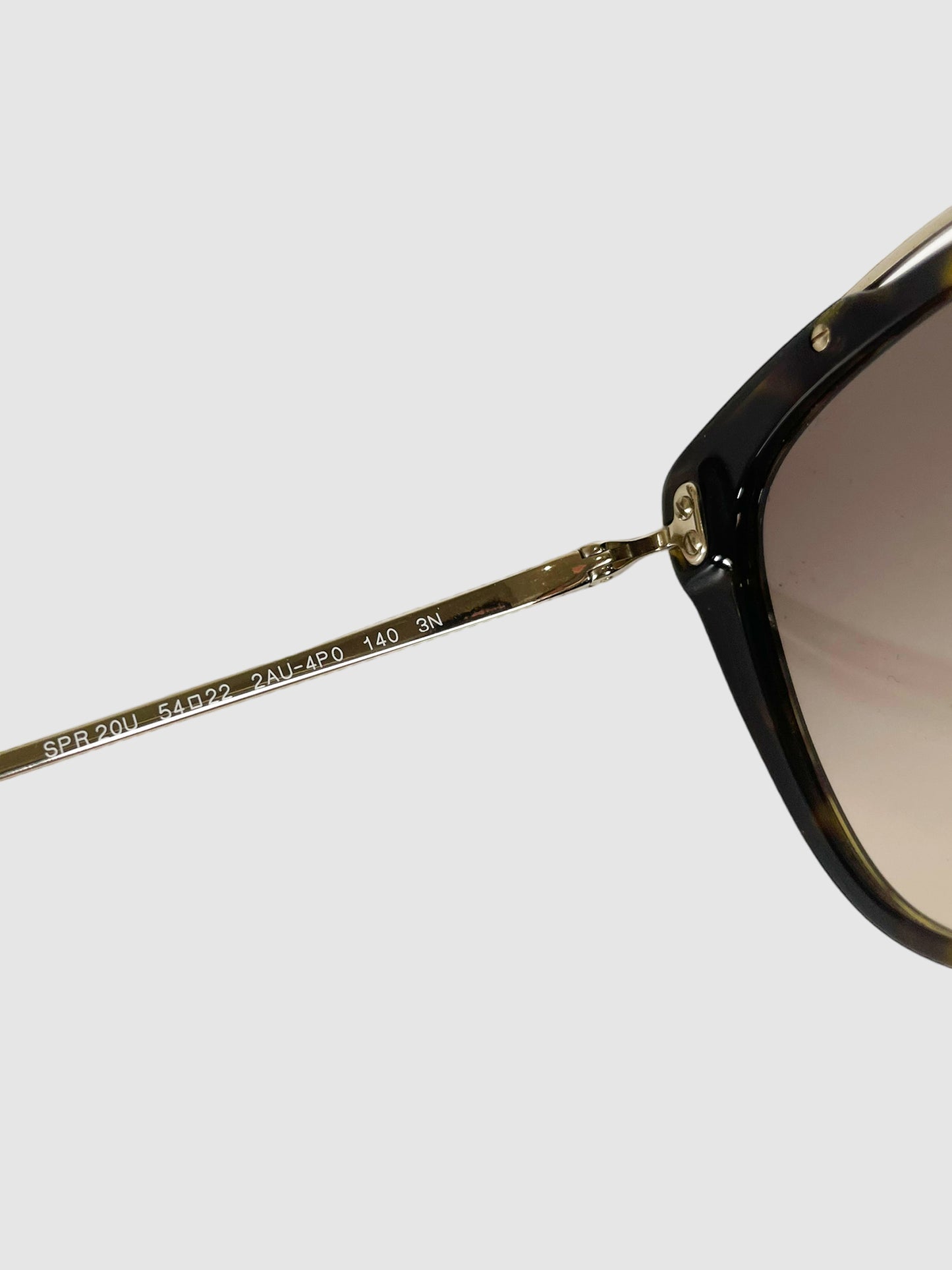 Prada Cat Eye Tinted Sunglasses